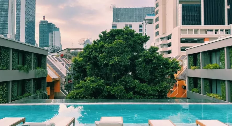 Working by the pool during an international Bangkok hospitality internship