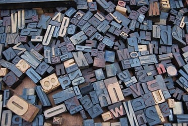 A jumble of blocks and letters.