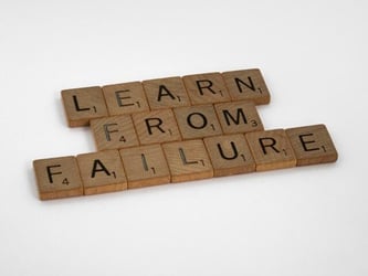 Scrabble tiles that spell out 'learn from failure.'