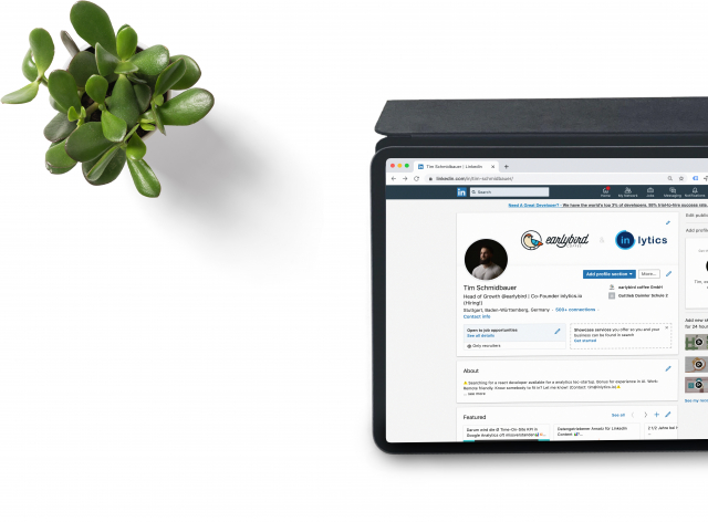 A computer tablet shows a LinkedIn profile