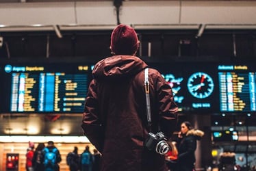 A young professional returning home after an internship abroad.