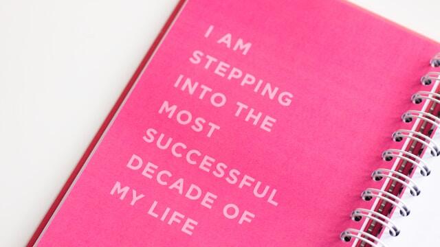 A notebook for an international internship printed with the quote 