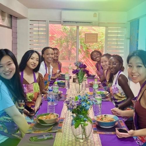 Interns from The Intern Group trying traditional Thai food in Bangkok.