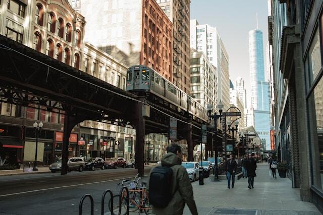 A young professional walking down a Chicago street.