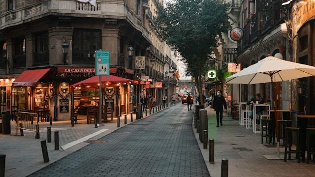 A street with cafes in Madrid, Spain.