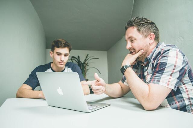 A parent talking to their child about doing an international internship with The Intern Group.