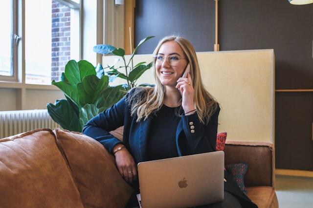 A young professional on a phone job interview.