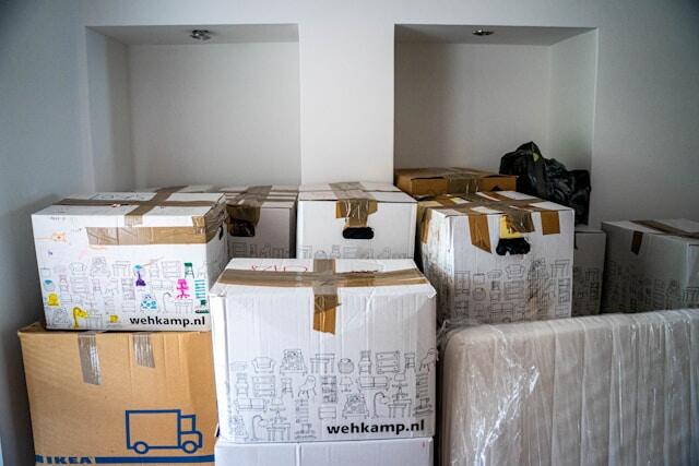 Somebody packing their belongings ready to move abroad for an international internship.
