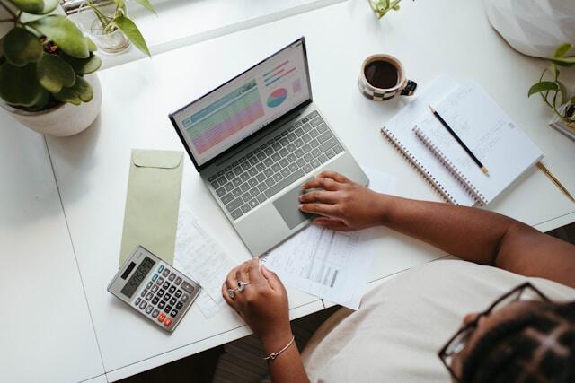 A CEO with international experience working at a desk.
