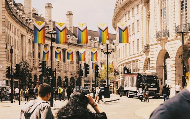 Progress Pride flags hanging up in a London street seen while interning in London.