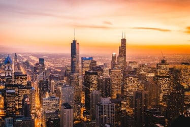 A view of Chicago's skyline at sunset.