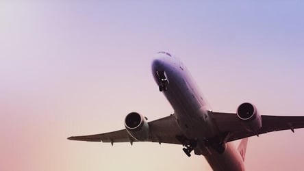 An airplane taking off at an airport.