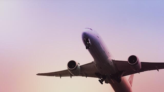 A plane taking off at an airport.