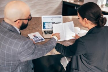 A professional going through their CV and resume at a job interview.