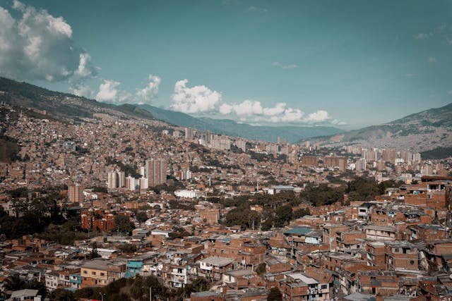 A view of Medellin, Colombia - a bustling city with mountains in the background.
