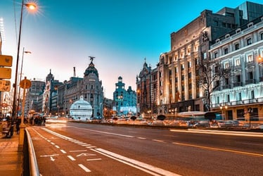 A street in Madrid, Spain at sunset.