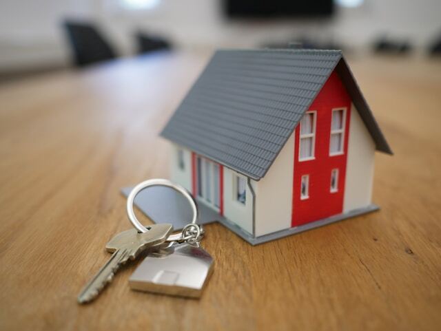 Giving keys to new homeowners during an internship abroad.
