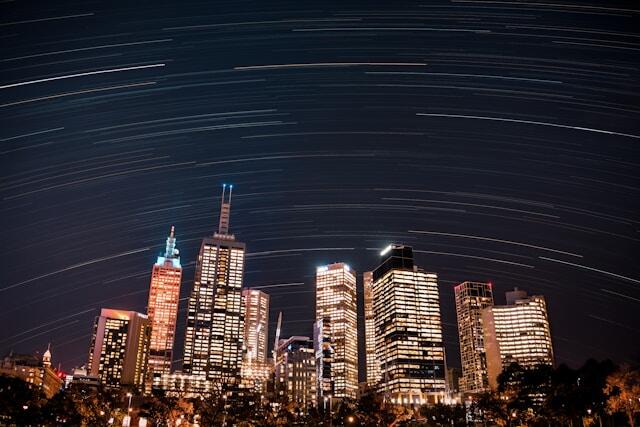A nighttime view of skyscrapers in Melbourne, Australia