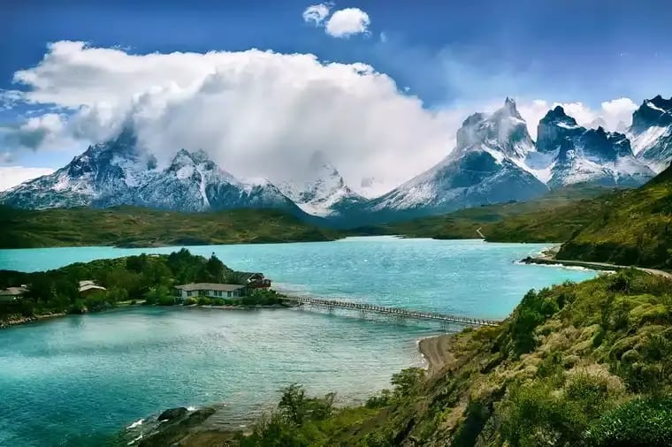 A view of a lake and mountains.