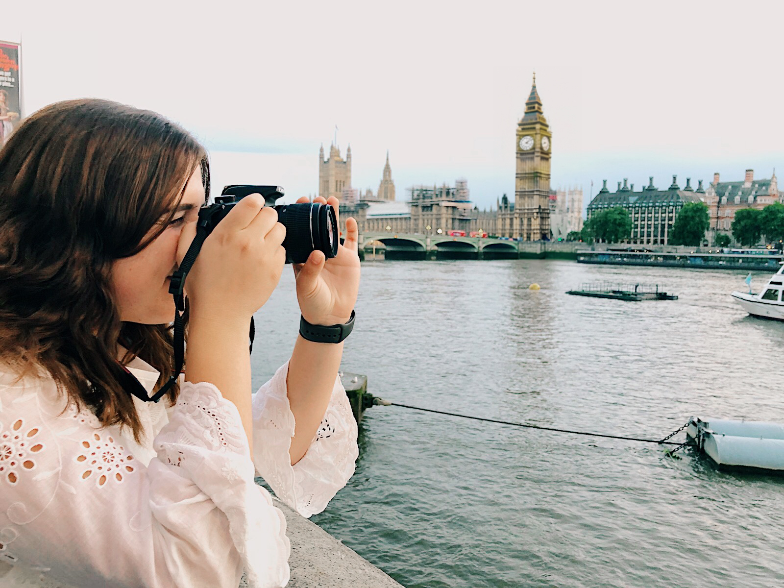 intern taking photo during in-person internship in London