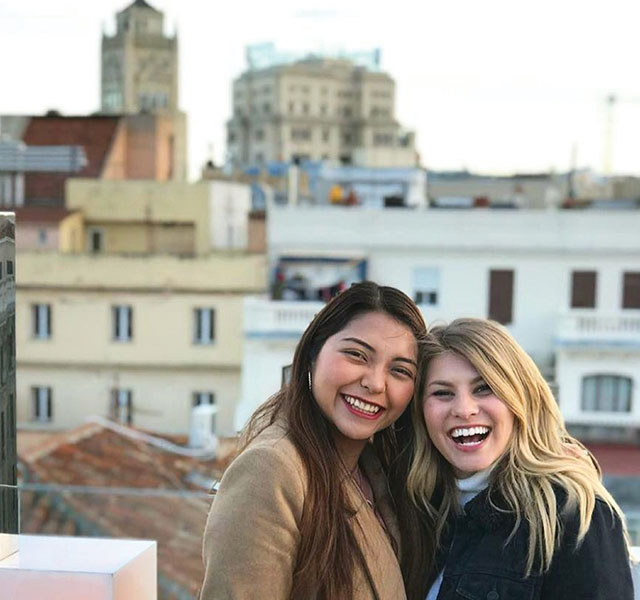 Posing with a colleague during a publishing internship in Spain