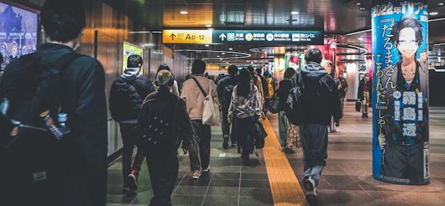 People walking through Shibuya station, Tokyo.