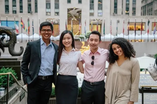 Posing with colleagues during an internship for language students in NYC