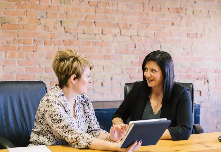 Speaking with colleagues during a social work internship in Melbourne