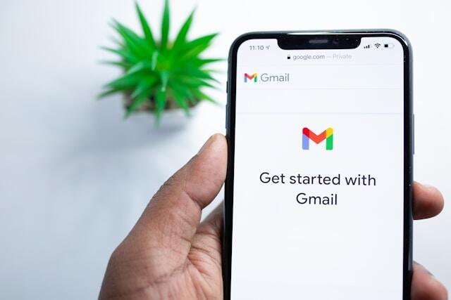 A phone with the Gmail app open. The screen tells you to 'Get started with Gmail'